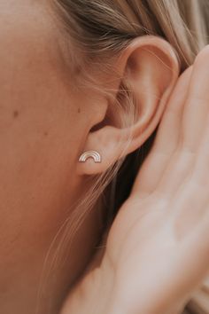 A pair of the most perfectly minimalist stud earrings, that you can wear every day because the posts are solid gold and will never bother your ears! What it Represents: Rainbows can hold so much meaning... representing a baby after loss, or just a reminder of sunshine and love especially after hard times. These match perfectly to our Hugging Rainbow Ring. The Materials: I wanted to make these as hypoallergenic AND as good of a price as possible. So the post in every pair (aka the part that you d Simple Internally Threaded Jewelry For Everyday, Simple Everyday Internally Threaded Jewelry, Modern Tiny Earrings For Everyday, Minimalist Stud Earrings, Rainbow Ring, Minimalist Earrings Studs, Rainbow Rings, Minimalist Studs, Just A Reminder