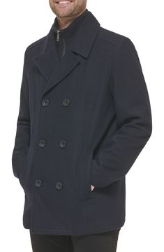 Add this classic wool peacoat to your wardrobe for an elevated style. Notched collar Long sleeves Button front Dual pockets 58% wool, 35% polyester, 4% acrylic, 3% other fibers Dry clean Imported Model stats: 6'1" height, 32" waist. Model is wearing size M. Elevated Style, Wool Peacoat, Pea Coat, Notched Collar, Clothing Styles, Mens Clothing, Kenneth Cole, Mens Clothing Styles, Double Breasted