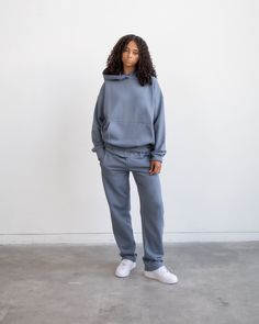 Made with a relaxed straight leg silhouette, these sweatpants are designed with comfort and style in mind. 100% Cotton Relaxed fit Elasticized waist with drawstring and side slit pockets Male model is 6'1 wearing size L Female model is 5'10 wearing size M Open Bottom Sweatpants, Drop Shoulder Hoodie, Hoodie Size Chart, Female Model, Knit Cuff, Male Model, Drop Shoulder, Kangaroo Pocket, Rib Knit