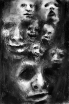 a black and white photo with many faces