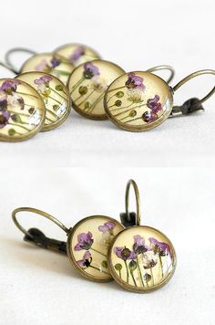 two pictures of earrings with flowers on them