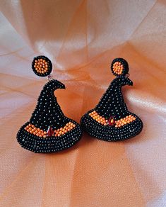 ♡ Cute Witches Hat Beaded Earrings ♡ Halloween Statement Earrings! ♡♡ Fully beaded feltback earrings! Super Cute addition to any outfit for SPOOKY SEASON 👻 Handmade Witchy Earrings For Halloween, Witchy Halloween Party Earrings, Handmade Halloween Costume Earrings, Handmade Black Halloween Earrings, Black Beaded Dangle Earrings For Halloween, Witchy Black Earrings For Festival, Adjustable Beaded Earrings For Halloween, Black Dangle Beaded Earrings For Halloween, Black Witchy Earrings For Festival