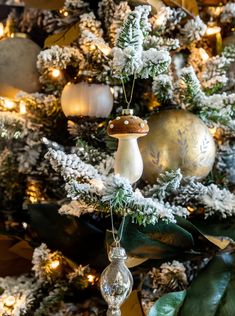 a christmas tree with ornaments hanging from it