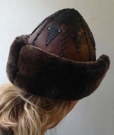 "Completely hand stitched Handmade This Leather hat is extremely thick and very warm.Made Genuine leather and Sheep Fur. Please be sure to measure the size of your head before buying. Measuring; Measuring for your head size is, You can use a tape measure (or a length of string that you will have to hold up to a tape measure) to determine the length. Place the string or tape around your head about 1/8\" above your ear, across the mid-forehead, completely circling your head. Hold the tape firmly, Brown Handmade Mini Hats With Curved Brim, Handmade Brown Mini Hat With Short Brim, Unique Handmade Brimmed Mini Hats, Handmade Brown Mini Hats With Curved Brim, Handmade Wide Brim Winter Costume Hats, Unique Handmade Wide Brim Costume Hat, Handmade Brown Brimmed Costume Hats And Headpieces, Handmade Western Brimmed Costume Hats And Headpieces, Handmade Western Brimmed Costume Hat