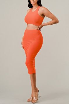 Our Cropped Curved Hem Tank Top Skirt Set is the perfect pick for fashion-savvy fashionistas. This two-piece set includes a cropped top with a curved hemline and a skirt with an A-line silhouette. Crafted from a lightweight, breathable blend of fabrics, this set ensures they stay cool and comfortable all day long. Fabric & fit: Model is wearing size Small. Tank Top Skirt, Top Skirt Set, Cropped Top, Stay Cool, Skirt Set, A Line, Two Piece, Tank Top, Crop Tops