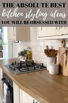 a kitchen with white cabinets and wooden counter tops, the words above it are in black