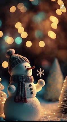 a snowman with a hat and scarf standing in front of some christmas tree lights