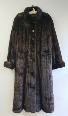 Vintage Yves Saint Laurent YSL Mink Fur Long Coat. Condition is "Pre-owned". Shipped with USPS Priority Mail. In excellent condition - no flaws. 5 buttons, 2 deep pockets and sleeves can be rolled up or down.  Measurements: around chest 52" arms 29" length 52". Classic Long Fur Coat For Formal Occasions, Classic Formal Fur Coat, Classic Brown Fur Coat For Formal Occasions, Mohair Coat, Fur Long Coat, Vintage Yves Saint Laurent, Fur Coats, Mink Fur, Long Coat