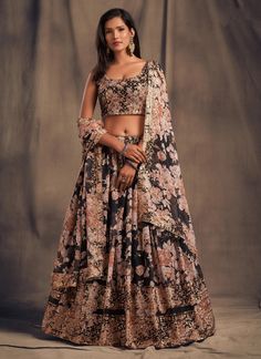 Elevate your look with our Excellent Black Digital Printed Embroidered Lehenga Choli. Designed for USA Women, this readymade traditional Indian ensemble is perfect for weddings. Made with high-quality organza fabric, the intricate embroidery and digital printing add a touch of elegance. Stand out on your special day with this stunning chaniya choli. The unstitched blouse can be customized upto 46 inches. Do Note: All the accessories shown are for styling purpose only. Slight color variation may Black Lehenga Choli, Dupatta Dress, Black Dupatta, Lehenga Choli Designs, Black Lehenga, Floral Lehenga, Organza Lehenga, Weddings Receptions, Zari Embroidery