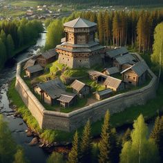 an aerial view of a castle in the middle of a forest with trees around it