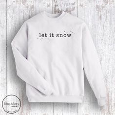 "Let it Snow" Holiday graphic in black on front of sweatshirt. Adult Sizes S-XXL (unisex sizing)Youth Sizes S-XL (unisex sizing) All Let It Snow Sweatshirts click here to view.All Let It Snow Tees click here to view.Gildan 18000 Heavy Blend, Port & Co, Jerzzees (availability varies)50/50 cotton/polyesterClassic, unisex fit1x1 rib with spandex Snow Holiday, Cousin Crew, Sewing 101, Camp Style, Diy Halloween Projects, Sewing Workshop, Holiday Sweatshirt, Football Outfits, Snow Winter