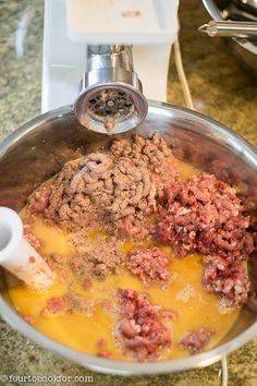 the food is being prepared in the pot on the stove top and ready to be cooked