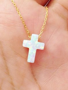 Synthetic White Opal Cross pendant, comes with a 925 Sterling Silver necklace, Yellow gold plated, Rose gold plated. Notice that this necklace comes with extender to adjust to different lengths. Chain total length : 39.5 cm / 15.5 inches not included extender. Extender length : 2.5 cm / 1 inche approximately Cross size: 12mm x 9mm Spring clasp Our jewelry is packaged in a beautiful gift box. If you need a necklace as a gift, we can ship to third party. During check out, please leave a note in th Spiritual White Clavicle Chain Jewelry, White Cross Necklace As A Gift, White 14k Gold Cross Necklace Gift, White 14k Gold Cross Necklace As Gift, White Cross Jewelry For Gifts, 14k Gold White Cross Necklace As Gift, White Cross Jewelry Gift, White Cross Jewelry For Gift, 14k Gold Cross Jewelry In White