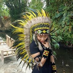 Yellow Feather Indian Headdress Replica This Headdress is 100% handmade from feathers. * Head circumference: 59 centimeters / 23 inches * Length : Medium * Beads color and pattern may vary each headdress WHY US? * 100% Handmade and Eco Friendly Product * Finest Quality - Each item will go through a Quality Control process before shipping. * No Markup Price * Every purchase supports Balinese Artisans - All Artisans will keep on following their passions while providing for their families. SHIPPING Bohemian Fitted Costume Hats And Headpieces For Festival, Bohemian Fitted Festival Costume Hats And Headpieces, Carnival Festival Costume Hats With Feathers, Bohemian Costume Hats And Headpieces With Feathers For Festivals, Festival Costume Hat With Feathers, Festival Feathered Costume Hat, Festival Costume Hats And Headpieces With Feathers, Eco Friendly Product, Indian Hat