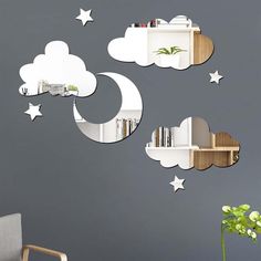 the moon and cloud wall decals are on display