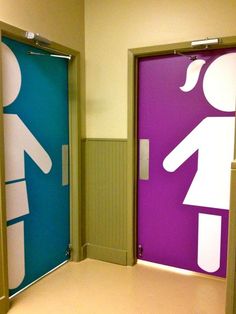 two restroom doors with white and blue symbols on them, one is open to the other side