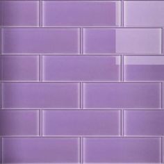 a purple brick wall is shown in this image