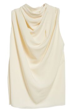 Swathed in voluminous asymmetric draping, this elegant sleeveless top is graced with a high cowl neck and cutaway shoulders. 23 1/2" length (size 40FR) Back keyhole with hook-and-eye closure Cowl neck Sleeveless, with cutaway shoulders Lined 100% polyester Dry clean Made in Italy Designer Clothing Cream Sleeveless Evening Top, Elegant Draped Tops, Elegant Spring Tops With Cowl Back, Cream Sleeveless Top For Formal Occasions, Elegant Asymmetrical Tank Top For Party, Chic Evening Drapey Blouse, Drapey Party Top, Elegant Cowl Neck Blouse For Spring, Elegant Party Blouse With Drapey Fit