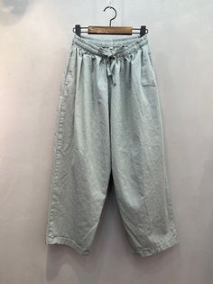 "Women's Organic Twill Cotton 100% Wide Legs Baggy Pants Size One size, good for US size 4-12 Waist width 32cm /12.6\" Length 82cm /32.3\" Fabric and Care Organic twill cotton 100% Machine washable and tumble dry Made in S Korea" Solid Color Baggy Wide Leg Parachute Pants, Solid Baggy Wide Leg Parachute Pants, Baggy Wide Leg Pants With Drawstring, Baggy Solid Color Cargo Pants, Baggy Solid Cargo Pants, Gray Baggy Straight Leg Bottoms, Casual Plain Bottoms For Summer, Spring Ankle-length Parachute Pants With Drawstring, Casual Plain Summer Bottoms