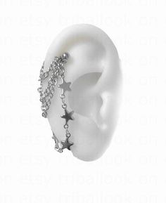 a white ear with silver stars on it