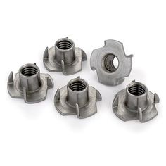 six stainless steel nuts are shown in this image, with one nut on each side