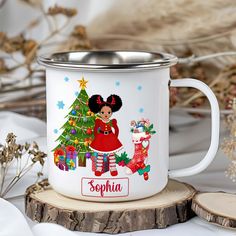 a personalized christmas mug with minnie mouse on it