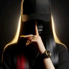 a woman with long hair wearing a black hat and gold ring holding her finger up to her face