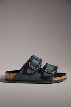 * Leather upper* Shearling insole* Rubber outsole* Slip on styling* Imported Birkenstock Big Buckle, Shearling Sandals, Birkenstock Colors, Birkenstock Arizona Big Buckle, Arizona Big Buckle, Black Birkenstock, Black Oil, Birkenstock Sandals, Buckle Sandals