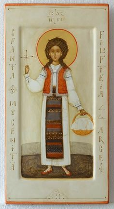 an icon depicting the person holding a basket and wearing a red vest, standing in front of a white wall