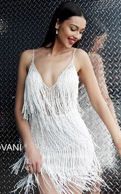 Jovani 61883 - Beaded/ embellished fringe dress that features a v-neckline and a low open back. White Fringe Dress, Short Sheath Dress, Evening Mini Dresses, White Fringe, Look Retro, Jazz Age, Roaring Twenties, Fringe Dress, Dress Spaghetti