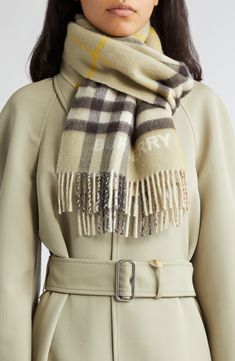 Get two classic looks in one with a double-face cashmere scarf trimmed with twisted fringe. 12" x 66"; 2 1/2" fringe 100% cashmere Dry clean Made in the UK Giant Check, Cashmere Scarf, Double Face, Classic Looks, The Uk, About Uk, Burberry, Cashmere