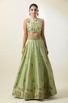 Pista attached can-can kalidar lehenga featuring floral embroidery. Paired with an embroidered padded blouse and a sheer dupatta. - Aza Fashions Fitted Silk Lehenga, Sleeveless Lehenga With Pallu For Eid, Sleeveless Lehenga With Floral Embroidery For Eid, Fitted Green Palazzo Set With Floral Embroidery, Fitted Raw Silk Anarkali Set With Floral Embroidery, Sleeveless Floral Embroidered Choli For Eid, Fitted Sleeveless Anarkali Set For Reception, Fitted Pista Green Palazzo Set For Reception, Sleeveless Floral Embroidery Choli For Eid