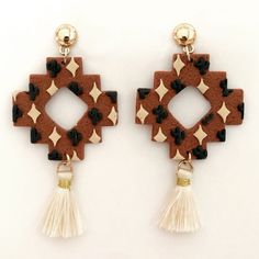 I Handcrafted These Southwestern Bohemian Earrings Out Of Polymer Clay And They Are Brand New And Fresh Out Of The Oven. Lightweight, Comfortable Dangle Earrings That Have Round Gold Ball Posts Instead Of Hooks. Aztec/Tribal Geometric Step Shape With Textured Terracotta/Rust Brown Background And Covered With Little Beige/Cream Diamonds And Dark Green Cactuses. There’s A Diamond/Square Shaped Cutout In The Center, And A Cream Tassel Completes The Look. There Are Some Minor Imperfections That Add Indian Clay Earrings, Western Clay Jewelry, Brown Clay Earrings, Clay Cross, Gold Rhinestone Earrings, Y2k Earrings, Diy Earrings Polymer Clay, Brown Clay, Earrings Polymer