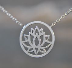 Fantastic and spiritual... This lotus necklace is part of our new spring collection. It is made of 925 sterling silver and has a simple lotus flower motif, which will be the perfect addition to your outfit. The lotus flower is the symbol of purity of heart, creativity, faithfulness and enlightenment. Love and life are also among the long list of meanings ascribed to this majestic flower. To give a precious feeling to your mother, girlfriend or yourself, this necklace would be the perfect gift choice. Be it as a Christmas gift, birthday gift, Mother's Day gift or even bridal jewelry. It is also available in a set with a bracelet, earrings and ring, making them the perfect gift idea for your loved ones. You can find the products under the following links: https://www.etsy.com/de/listing/1200 Adjustable Hypoallergenic Sterling Silver Necklace, Symbolic Sterling Silver Charm Necklaces For Mother's Day, Spiritual Sterling Silver Nickel Free Charm Necklace, Adjustable Sterling Silver Necklace As Gift For Mom, Spiritual Silver Jewelry Gift For Mom, Mother's Day Symbolic Sterling Silver Charm Necklaces, Sterling Silver Flower Jewelry For Everyday, Delicate Adjustable Sterling Silver Charm Necklaces, Spiritual Sterling Silver Hypoallergenic Necklace