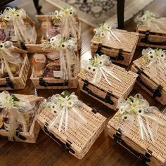 baskets with flowers and ribbons tied around them