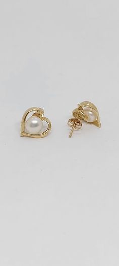 Heart 14k Yellow Gold WHITE Pearl Stud Earrings. Freshwater White Pearl 14k Solid Yellow Gold Earring. Wedding Pearl Earrings. Pearl LOVER. Earring. Product Info:                                                -Earring dimensions: 10mm x 10mm. -Stones: Freshwater Pearls. -Pearl Size :4mm -Stone Numbers: 2 -Metal: 14k  -Finish: Yellow Gold.  -Closure: Push back -Made in USA. -Nice Gift box is included. Wedding Pearl Earrings, Earring Wedding, Pearl Earrings Wedding, Earrings Pearl, Gold Earring, Pearl Wedding, Yellow Gold Earring, Pearl Stud Earrings, Pearl Size