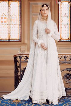 Buy Latest Premium White Pakistani Wedding Dress Online 2021 with beautiful embroidery,dabka, kora work. Pakistani bridal dress with fast shipping in USA Elegant Wedding Sherwani In Georgette, Elegant Georgette Sherwani For Wedding, Floor-length Resham Embroidered Wedding Dress, White Salwar Kameez With Pearl Embroidery For Reception, White Wedding Dresses With Mirror Work, Elegant Wedding Sherwani With Sheer Dupatta, Wedding Sherwani With Intricate Embroidery In Georgette, Elegant Wedding Gown With Dabka Work, Wedding Gown With Pearl Embroidery For Eid