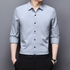 A long sleeve professional shirt is a versatile piece of clothing. It can be worn with a suit or a dress to add an element of class to any ensemble. It can also be worn as a layer during colder months. Do you wanahavit? Casual Korean Dress, Fit Mens Fashion, Mens Fashion Dress Shirts, Hipster Man, Tuxedo Dress, Slim Fit Blazers, Casual Belt, Korean Dress, Shirt Dress Style