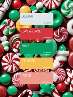 some candy canes and other candies are arranged in the colors red, orange, green