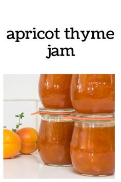 apricot thyme jam in jars with oranges on the side