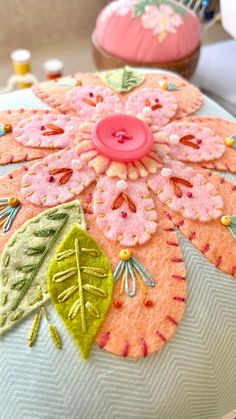 a close up of a decorative pillow with buttons on the front and back of it