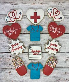 decorated cookies are arranged in the shape of doctors