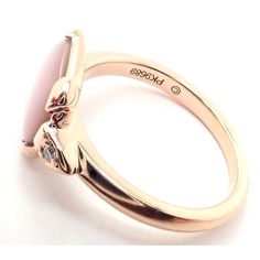 Cartier Tortue 18k Rose Gold Diamond Mother Of Pearl Ring   Metal: 18k Rose Gold  Size: 5 1/4  Weight: 4.1 grams  Width: 9mm  Stone: 1 round brilliant cut diamond VS1 clarity, E color  Hallmarks: Cartier 750 50 PK9689 T3307mdhd  Dimensions reference the ring size and are not specific to the ring itself. Mother Of Pearl Ring, Rose Gold Diamonds, Buying Jewelry, Round Brilliant Cut Diamond, Pearl Ring, Brilliant Cut Diamond, Metal Rings, 18k Rose Gold, Round Brilliant