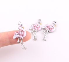 Flamingo charms pendant,Pink Birds charm,enamel charms bulk,Pink rhinestone feathers ,Tropical charms jewelry craft accessories ♥ ♥ Welcome to my shop ,happy shopping ♥ ♥ this charm is really beautiful, and it is still a very special shape.But it's really cheap. If you hang it on a keychain or on a bag, used to make earrings,or give it to someone else as a gift, it's a good fit. ♥ Color: pink ♥ Size : 15mm*30mm ♥ Material : Zinc alloy ,rhinestone ♥ Quantity : 6pcs / 12 pcs ♥ If you have any ques Pink Enamel Charms Jewelry, Pink Enamel Jewelry With Charms, Pink Enamel Charms For Gifts, Pink Dangle Charms For Gifts, Pink Pendant Charms For Gifts, Pink Enamel Dangle Jewelry, Pink Metal Charms With Lobster Clasp, Pink Nickel-free Dangle Charms, Handmade Pink Dangle Charms