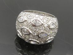 925 Silver - Vintage Cubic Zirconia Tear Drops Dome Band Ring Sz 8 - RG19411  925 Silver - Vintage Cubic Zirconia Tear Drops Dome Band Ring Sz 8 - RG19411  Jewelry Type:         Ring  Metal Type:            925 Silver   Metal Size:             8 Finger  Stone Type:            Cubic Zirconia   Condition:              N/A  Jewelry Weight:     12.1 Grams  PLEASE NOTE: THIS ITEM IS PRE-OWNED. ALTHOUGH MOST ITEMS ARE IN VERY GOOD CONDITION, SOME MAY NEED CLEANING AND/OR MINOR REPAIRS. WE MAKE A VERY Tear Drops, Ring Metal, Antique Rings, Rings Statement, Band Ring, Beautiful Necklaces, Band Rings, Statement Rings, Unique Pieces