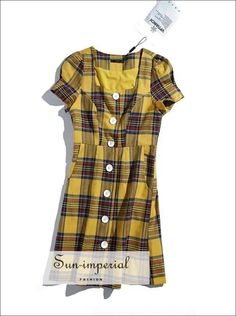 Material:COTTON Silhouette:Straight Season:Spring Neckline:Square Collar Sleeve Length(cm):Short Sleeve Style:REGULAR Decoration:Button Style:Casual Waistline:Natural Pattern Type:Plaid Dresses Length:Above Knee, Mini Size TableS : Shoulder 35cm(13.8") Bust 84cm(33.1") Hip 90cm(35.4") Length 82cm(32.3")M : Shoulder 36cm(14.2") Bust 88cm(34.6") Hip 94cm(37") Length 83cm(32.7")L : Shoulder 37cm(14.6") Bust 92cm(36.2") Hip 98cm(38.6") Length 84cm(33.1")the size be measured by ourselves, error 1-3cm Fitted Plaid Dress With Button Closure For Summer, Fitted Plaid Dress With Button Closure For Spring, Yellow Dress With Button Closure For Fall, Summer Plaid Short Sleeve Dress For Work, Fitted Plaid Dress With Buttons For Spring, Summer Plaid Dress For Workwear, Summer Plaid Dress For Work, Casual Plaid Dress With Button Closure For Summer, Summer Plaid Dress With Short Sleeves And Buttons