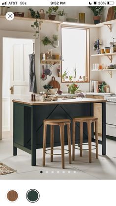 the instagram page shows an image of a kitchen with two stools