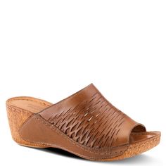 Spring Step Style: CUNACENA Mediterranean influenced, high quality premium leather slide sandal featuring a beautiful die-cut stretch-lattice design for increased breathability and flexibility, and dainty tonal stitchwork all on a strong stitched to sole construction, sculpted, comfort wedge with a flexible forefoot and a platform. Heel Height (approximately): 2 1/2" Platform Height (approximately): 3/4" Features: - Leather Upper. - Leather Lining. - Leather Insole. - PU Outsole. - Slip-on Closu Open Toe Sandals With Perforations, Perforated Open Toe Sandals, Spring Open Toe Clogs With Ortholite Insole, Slip-on Perforated Sandals For Spring, Spring Slip-on Sandals With Perforations, Perforated Slip-on Sandals For Spring, Leather Mules With Woven Sole, Modern Mules With Woven Sole, Spring Leather Clogs With Ortholite Insole