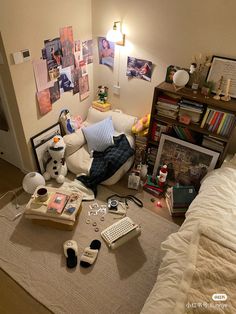 a living room filled with furniture and clutter