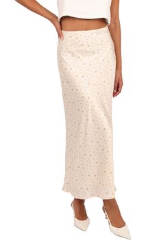 This flowy satin skirt is patterned in dainty blooms that bring fresh vibes to your look. Hidden side-zip closure Lined 95% polyester, 5% spandex Hand wash, dry flat Imported Feminine Satin Skirt For Spring, Silk Floral Print Flowy Maxi Skirt, Spring Floral Print Rayon Maxi Skirt, Spring Satin Flowy Maxi Skirt, Feminine Silk Bottoms For Spring, Spring Satin Maxi Skirt Flowy, Silk Floral Print Midi Skirt, Spring Silk Skirt With Floral Print, Spring Silk Flowy Maxi Skirt